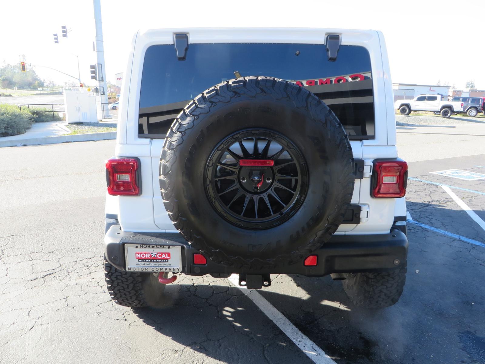 2020 White /TAN Jeep Wrangler Unlimited Rubicon (1C4HJXFG8LW) with an 3.6L V6 DOHC 24V FFV engine, 6A transmission, located at 2630 Grass Valley Highway, Auburn, CA, 95603, (530) 508-5100, 38.937893, -121.095482 - 3" Zone offroad suspension system, Fox adventure series shocks, rocksliders, Teraflex HD tire relocation, Mopar HD tailgate hinge, 17" KMC wheels, and 37" BFG KO2 tires. - Photo #5